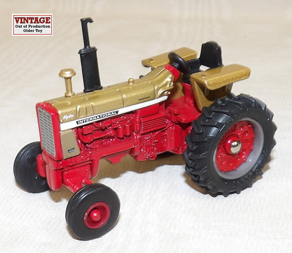 #14244A 1/64 International 1026 Gold Demostrator Tractor without Cab - No Package, AS IS