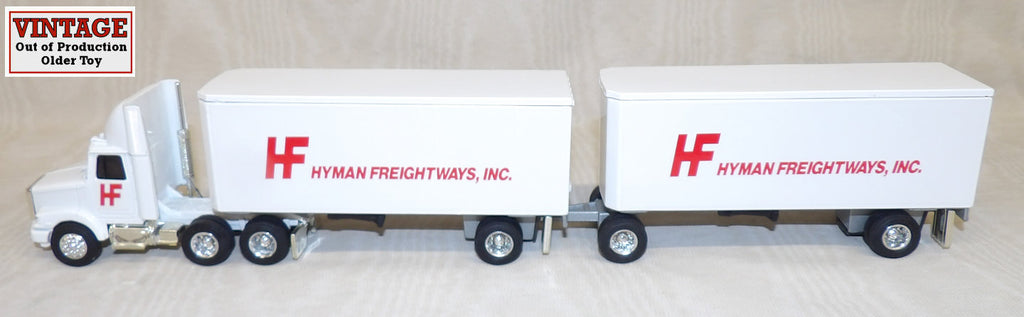 #2086 1/64 Hyman Freightways WhiteGMC Aero Conventional with Pup Trailers