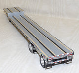 #30846 1/64 White Kenworth W900 with Transcraft Drop Deck Spread Axle Trailer