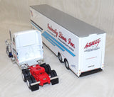 #36515 1/64 Intercity Lines Inc. Freightliner Classic XL Semi with Transporter Trailer