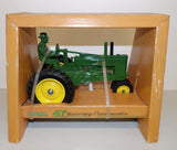 #557 1/16 John Deere Model A with Man, Ertl 40th Anniversary Commemorative Edition