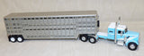 #60-1816 1/64 Blue & White Peterbilt Model 351 with 36" Sleeper & Vintage 45' Wilson Tandem-Axle Livestock Trailer