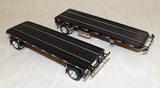 #60-1889 1/64 Black Peterbilt Model 379 Single Axle Day Cab with Dual 28.5' Utility Flatbed Trailers