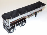 #60-2009 1/64 Blue & Black Kenworth W990 with 76" Mid-Roof Sleeper & MAC Half Round End Dump Trailer