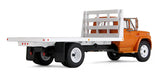 #60-2259 1/64 Omaha Orange 1963 GMC 4000 Single Axle Flatbed Truck
