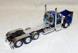 #60-2340 1/64 Blue & Black Peterbilt 589 Tri-Axle Day Cab with SmithCo Side Dump Tri-Axle Trailer