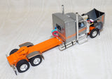 #621731 1/64 Silver & Orange Peterbilt Model 589 with 58" Mid-Roof Sleeper - No Box