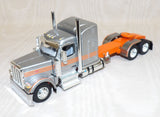 #621731 1/64 Silver & Orange Peterbilt Model 589 with 58" Mid-Roof Sleeper - No Box