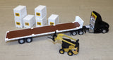 #84675 1/64 Black Peterbilt 579 with Flatbed Trailer, Cat 272D Skid Steer Loader & Pallet Boxes