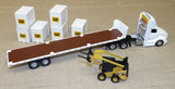 #84676 1/64 White Peterbilt 579 with Flatbed Trailer, Cat 272D Skid Steer Loader & Pallet Boxes
