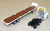 #84676 1/64 White Peterbilt 579 with Flatbed Trailer, Cat 272D Skid Steer Loader & Pallet Boxes